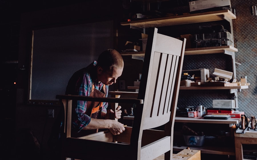 A woodworker building a chair in a workshop